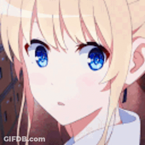 A Close Up Of A Girl With Blonde Hair And Blue Eyes . GIF