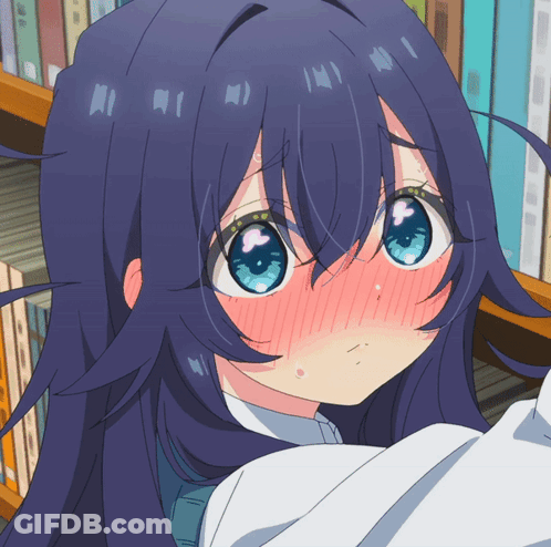 A Close Up Of A Girl With Blue Eyes And A Red Cheek GIF