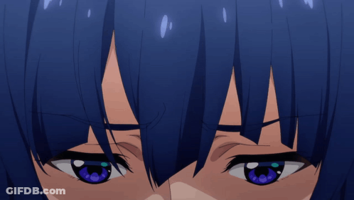 A Close Up Of A Girl With Blue Eyes GIF