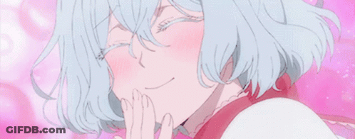 A Close Up Of A Girl With Blue Hair Covering Her Mouth With Her Hands . GIF
