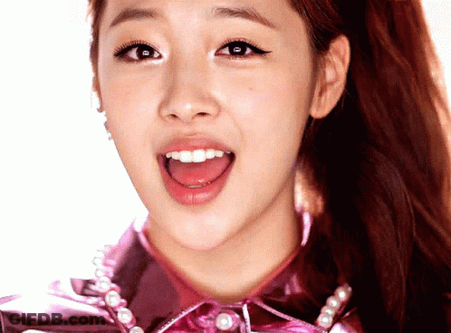 A Close Up Of A Girl With Her Mouth Open GIF