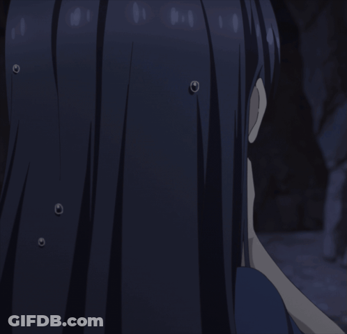 A Close Up Of A Girl With Long Dark Hair GIF
