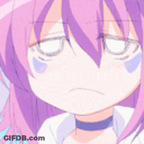 A Close Up Of A Girl With Pink Hair Making A Funny Face GIF