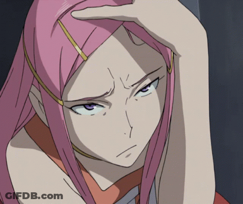 A Close Up Of A Girl With Pink Hair GIF
