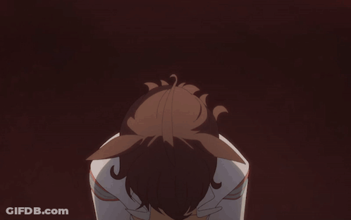 A Close Up Of A Girl With Red Eyes And A Headband GIF