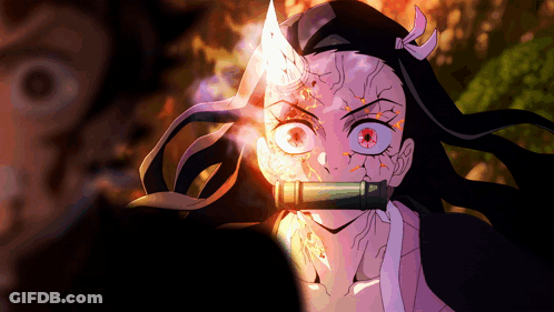 A Close Up Of A Girl With Red Eyes And A Horn On Her Head GIF