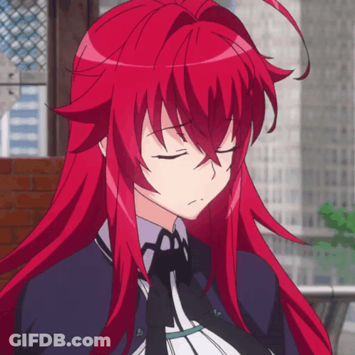 A Close Up Of A Girl With Red Hair GIF