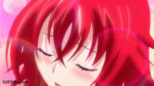 A Close Up Of A Girl With Red Hair GIF