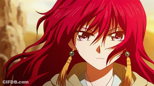 A Close Up Of A Girl With Red Hair GIF