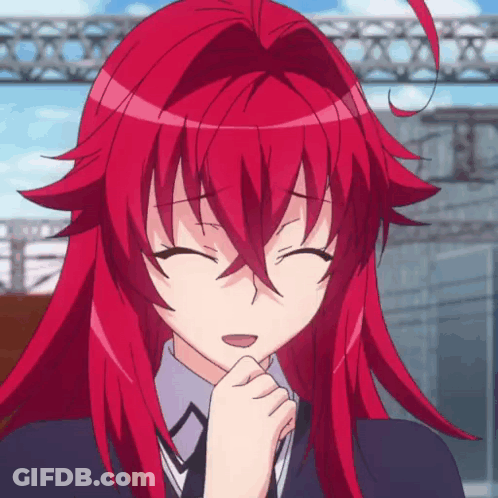 A Close Up Of A Girl With Red Hair GIF