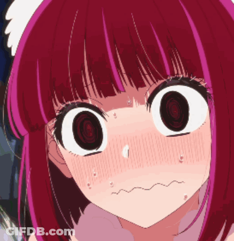 A Close Up Of A Girl With Red Hair Making A Funny Face GIF