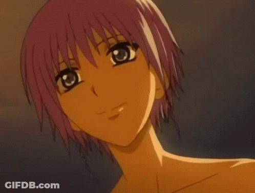 A Close Up Of A Girl With Short Orange Hair GIF
