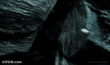 A Close Up Of A Gollum From The Lord Of The Rings Pointing At The Camera With His Finger . GIF