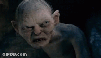 A Close Up Of A Gollum From The Lord Of The Rings With A Very Angry Look On His Face GIF
