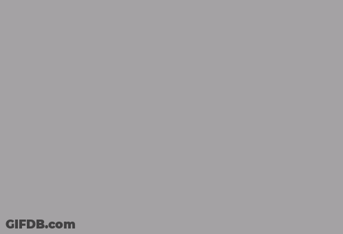 A Close Up Of A Gray Background That Looks Like A Plain Gray Background . GIF
