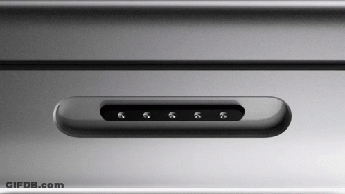 A Close Up Of A Gray Item With A Few Buttons On It GIF