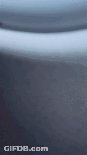 A Close Up Of A Gray Surface With A Few Lines On It GIF
