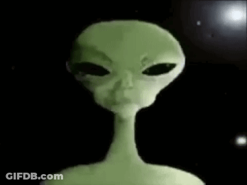 A Close Up Of A Green Alien With Black Eyes And A Long Neck . GIF