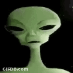A Close Up Of A Green Alien With Black Eyes And A Long Neck GIF