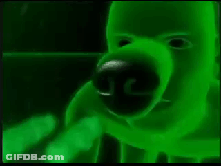 A Close Up Of A Green Monster 'S Face With A Glowing Nose And Mouth . GIF