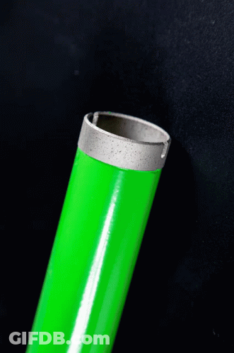 A Close Up Of A Green Pipe With A Silver Ring On It GIF