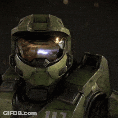 A Close Up Of A Halo Soldier 'S Helmet With A Light Coming Out Of It GIF