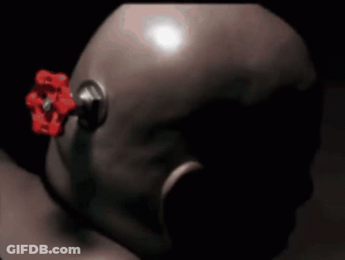 A Close Up Of A Head With A Red Valve Attached To It GIF