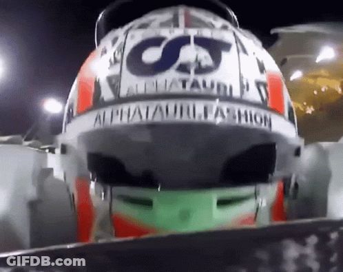 A Close Up Of A Helmet That Says Alphatauri Fashion On It GIF