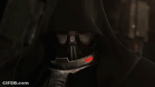 A Close Up Of A Hooded Figure With A Mask On His Face GIF