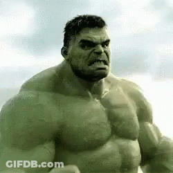 A Close Up Of A Hulk With A Beard And A Very Angry Face . GIF