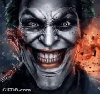 A Close Up Of A Joker 'S Face With A Huge Smile On His Face . GIF