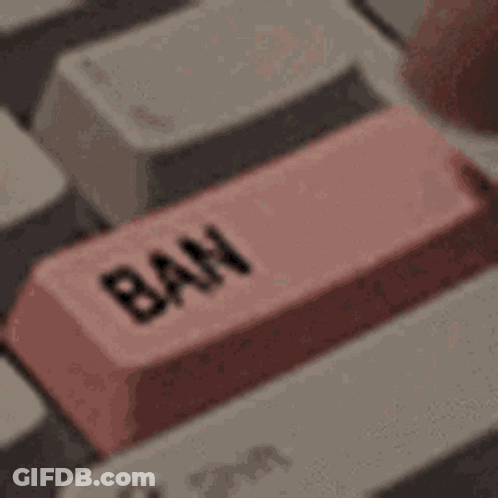 A Close Up Of A Keyboard With A Pink Button That Says Ban . GIF
