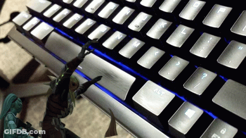 A Close Up Of A Keyboard With The Alt Key In The Middle GIF