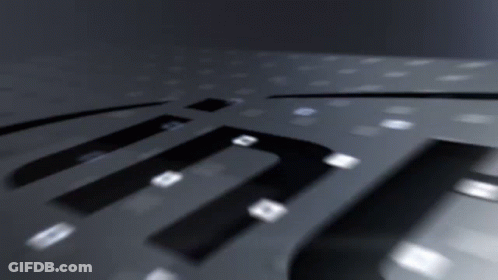 A Close Up Of A Keyboard With The Letters T And U On It GIF