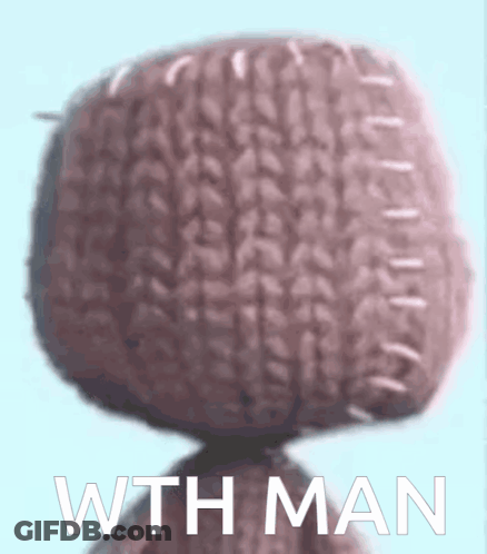 A Close Up Of A Knitted Object With The Words Wth Man Written Below It GIF