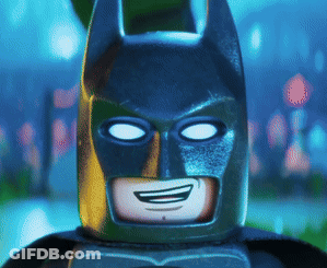 A Close Up Of A Lego Batman Smiling GIF