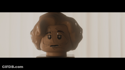 A Close Up Of A Lego Figure 'S Head With A Serious Look On His Face GIF