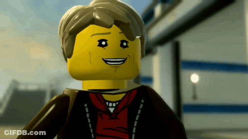 A Close Up Of A Lego Figure Smiling GIF