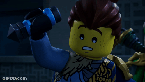 A Close Up Of A Lego Figure With A Sticker That Says ' 0101 ' On It GIF