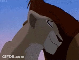 A Close Up Of A Lion From The Lion King Looking Down At Something . GIF
