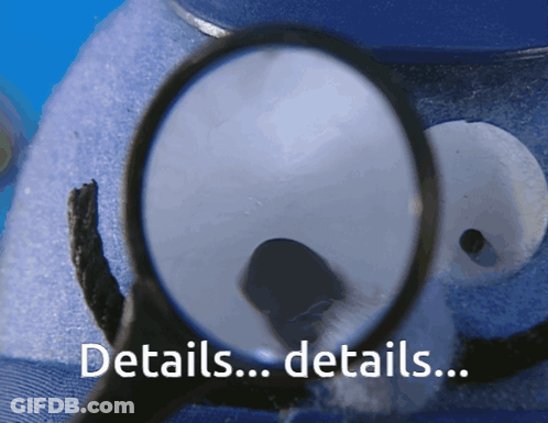 A Close Up Of A Magnifying Glass With The Words Details On The Bottom GIF