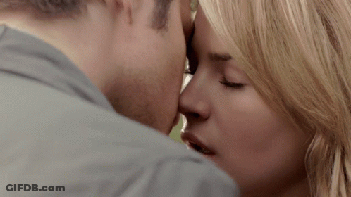 Close Up Of Man And Woman Kissing GIF