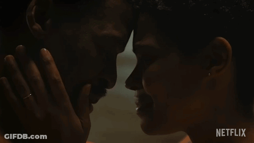 A Close Up Of A Man And Woman 'S Faces With The Netflix Logo Visible GIF