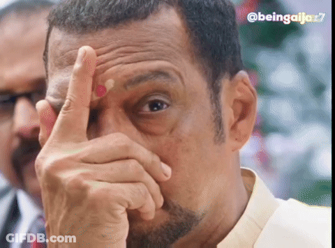 A Close Up Of A Man Covering His Face With His Hand With The Hashtag Beingaljo27 On The Bottom GIF