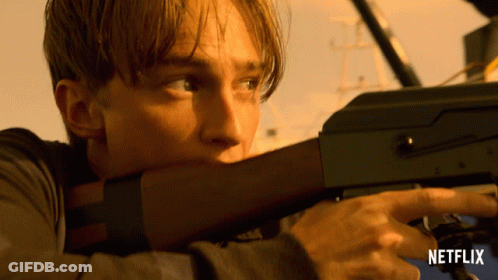 Man Holding Gun With Netflix Logo GIF