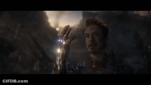 A Close Up Of A Man Holding A Lightning Bolt In His Hand In A Movie Scene . GIF