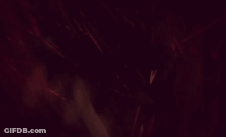 A Close Up Of A Man Holding His Head With Both Hands GIF