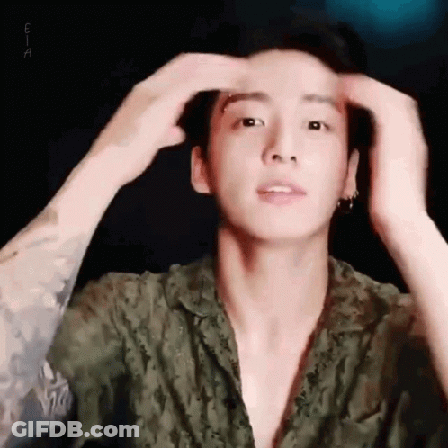 Close Up Of Man Holding Head With Hands GIF