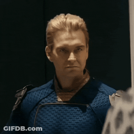 A Close Up Of A Man In A Blue Costume GIF
