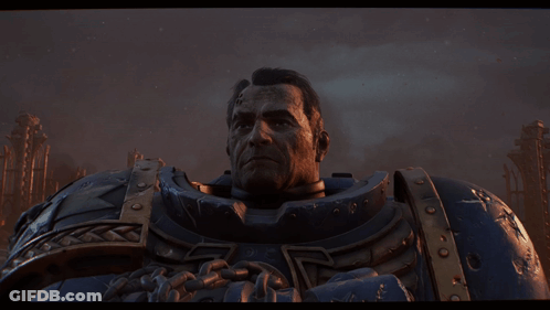 A Close Up Of A Man In A Blue Suit GIF